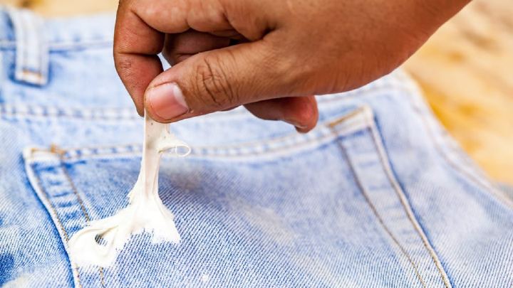 how to get sticky residue off clothing